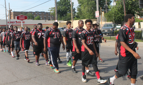 Glenville football team Marching in the 38th annual Glenville Community Parade