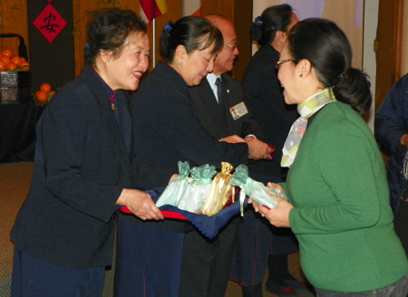 Tzu Chi Buddhists giving gifts