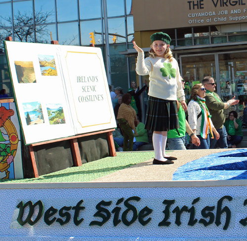 girl on float - West Side Irish American Club in the 2022 Cleveland St. Patrick's Day Parade