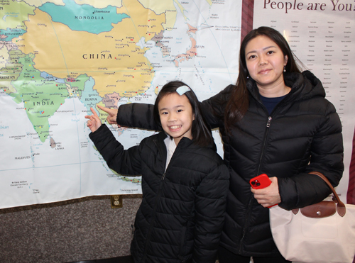 Pointing to the map of Burma (Myanmar)