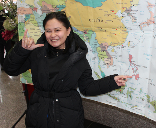 Pointing to the map of the Philippines