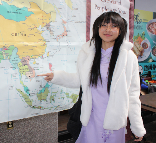 Pointing to the map of Vietnam