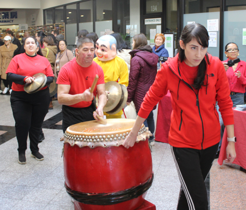 Kwan Family Lion Dance team coming through Asia Plaza