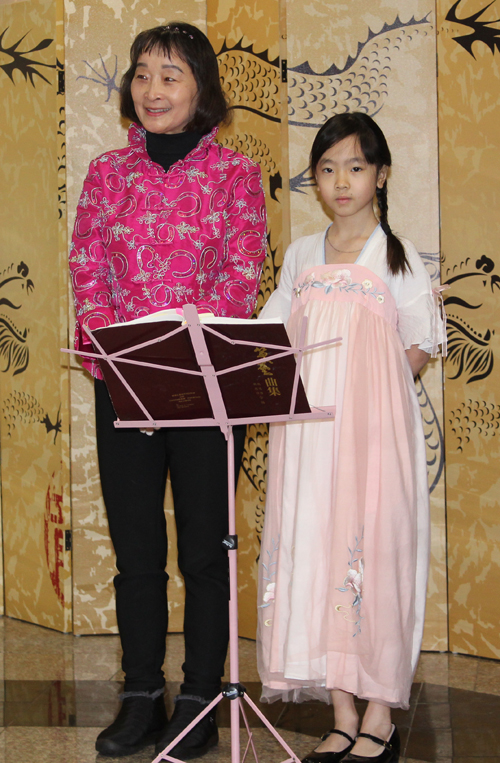 Young Student of Rosa Lee playing the guzheng