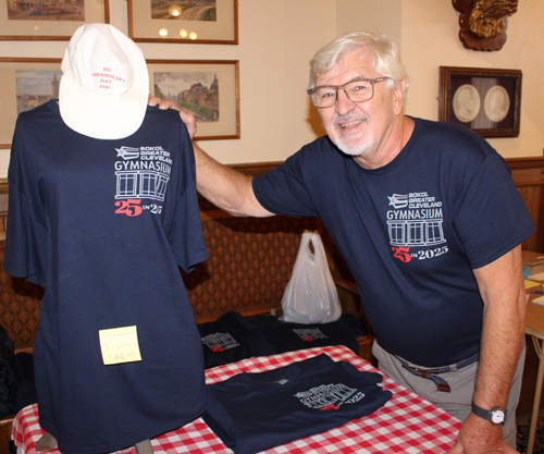 Paul Burik modeling the new 25 year gym anniversary t-shirt