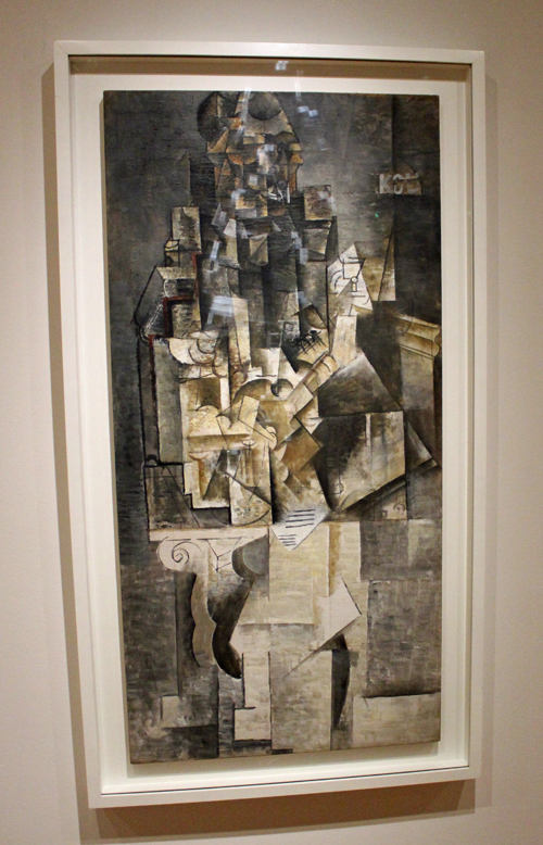 Picasso Man with a guitar collage