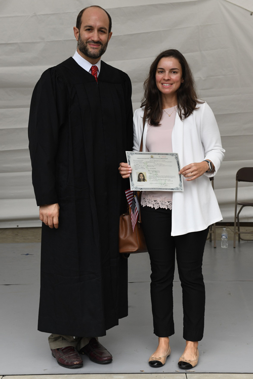 New citizens with Judge at Naturalization Ceremony at One World Day