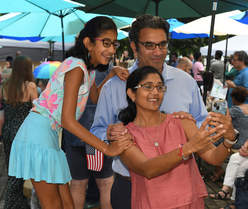 New citizens with Judge at Naturalization Ceremony at One World Day