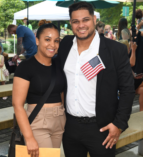 New citizens with Judge at Naturalization Ceremony at One World Day