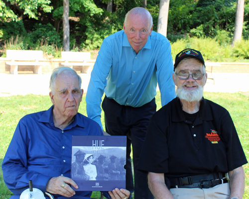 Joe Meissner and other veterans in the Vietnamese Garden on One World Day 2024