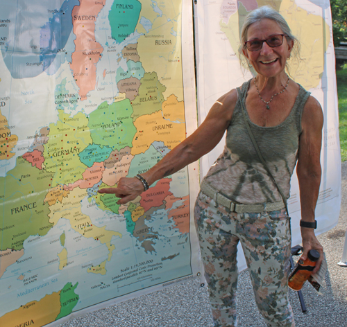 Pointing to map of Slovenia