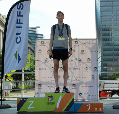 Pan Am Masters Games athlete with medal