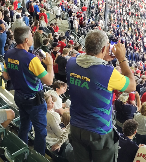 Athletes from Brazil watching the game