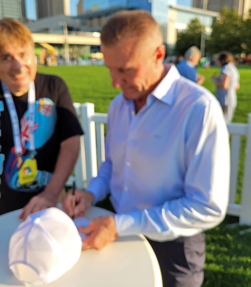 Sergey Bubka signing a hat for Dan Hanson