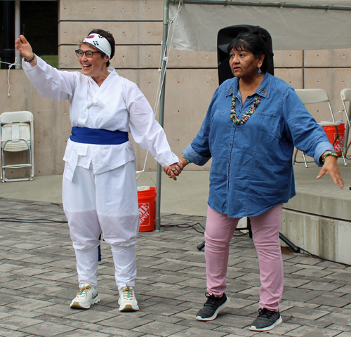 Dancing in the Cleveland Cultural Gardens to Native American drummers