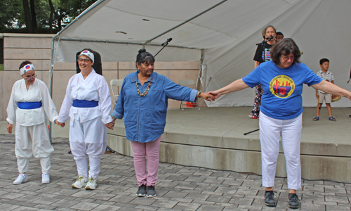 Dancing in the Cleveland Cultural Gardens to Native American drummers