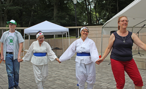 Dancing in the Cleveland Cultural Gardens to Native American drummers