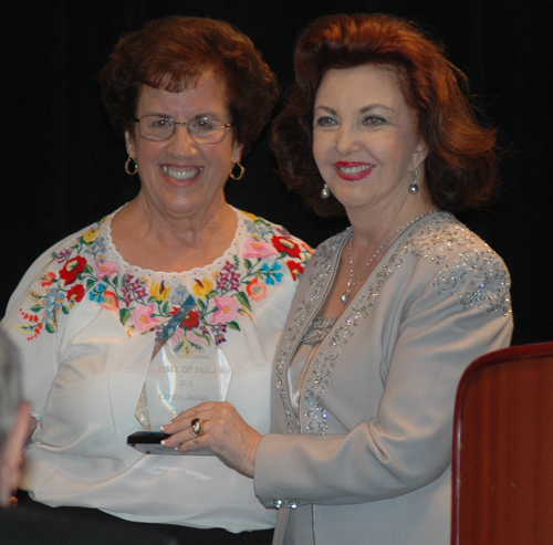 Dr. Maria Pujana inducting Carolyn Balogh into the Cleveland International Hall of Fame