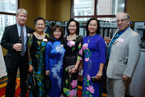 Mike and Oanh Powell, Gia Hoa Ryan and sisters and Joe Meissner