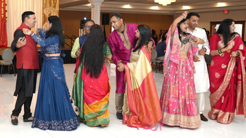 Couples dancing at FICA Diwali event