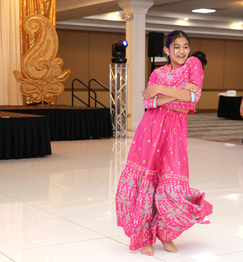 Girl dancing at FICA Diwali event