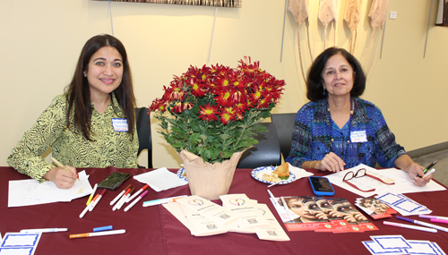 Helping Hands sign-in table