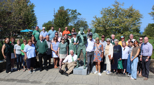 Group posing with the Johnny Kilbane statue in Cleveland's Battery Park