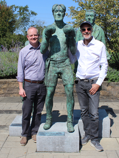 Kevin O'Toole and Rowan Gillespie Posing with the Johnny Kilbane statue in Cleveland's Battery Park