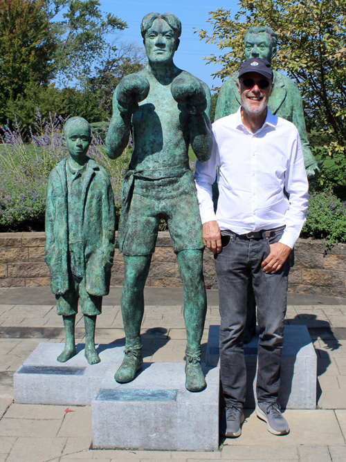 Sculptor Rowan Gillespie with the Johnny Kilbane statue