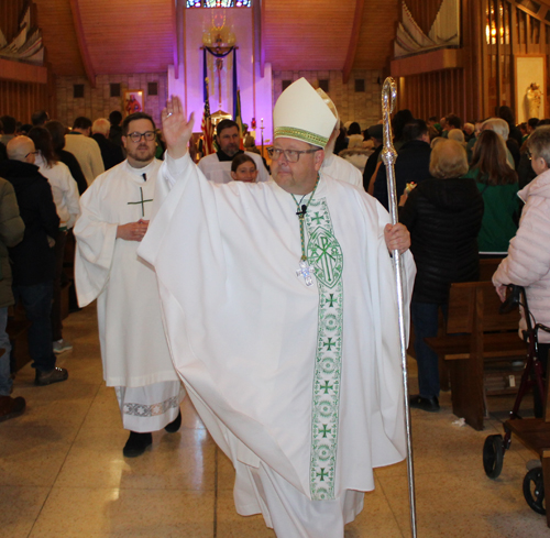 Bishop Edward Malesic leads the Recessional after Mass