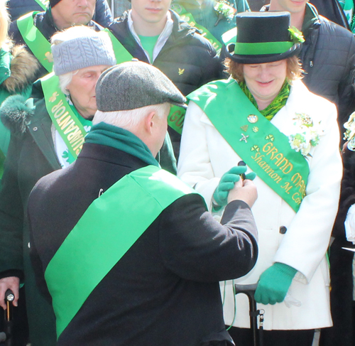 Grand Marshall Shannon Corcoran blows the whistle