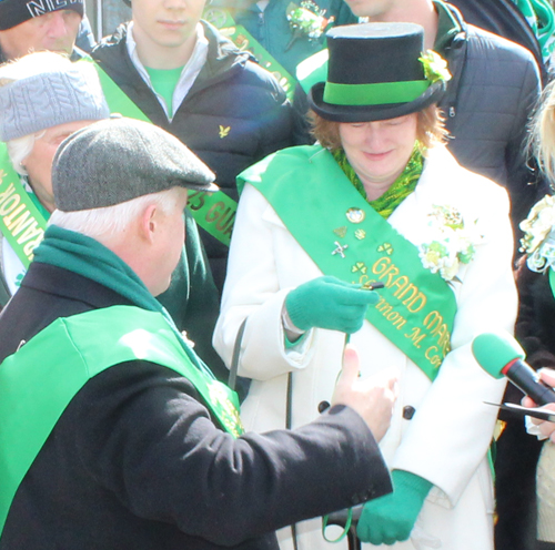 Grand Marshall Shannon Corcoran blows the whistle