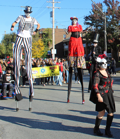 Stilt walkers at 2024 Cleveland Day of the Dead Parade 