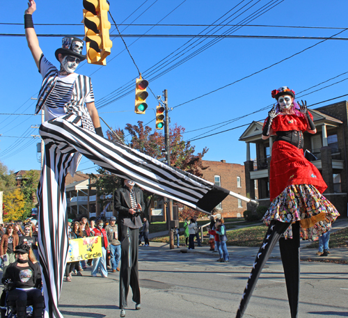 Stilt walkers at 2024 Cleveland Day of the Dead Parade 