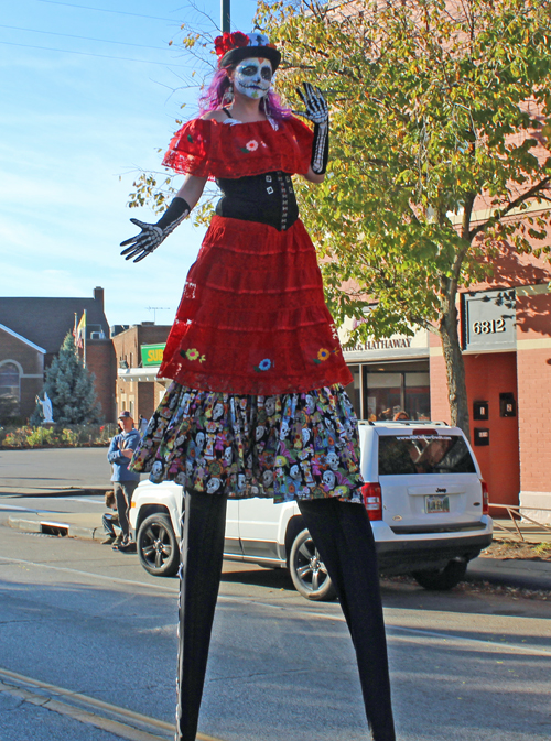 Stilt walkers at 2024 Cleveland Day of the Dead Parade 