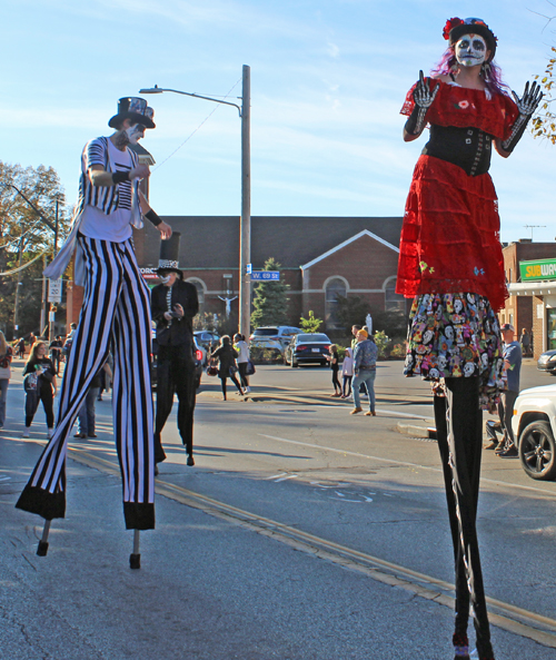 Stilt walkers at 2024 Cleveland Day of the Dead Parade 