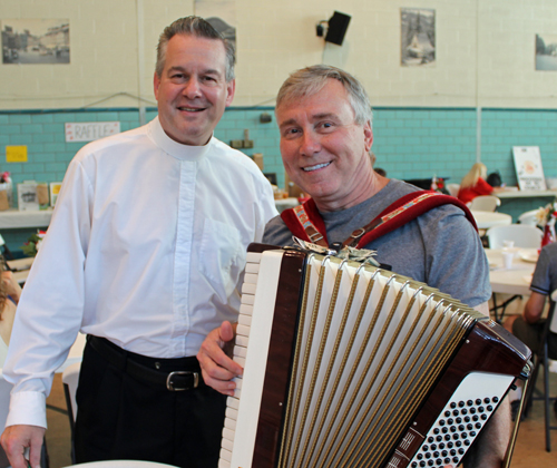 Pastor Fr. Eric Orzech and Tom Katrenich