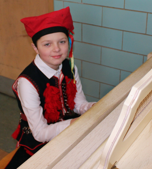 Polish boy playing piano