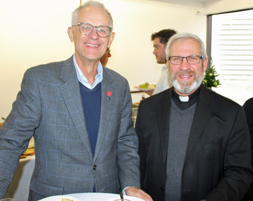 Tony Hocevar with Father John Kumse