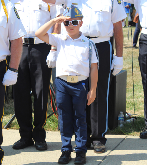 Boy saluting